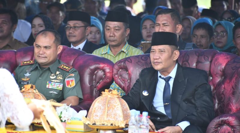 PJ.Bupati Morowali Bersama Dandim 1311/Mrw Hadiri Acara Pelantikan Kepala  Desa