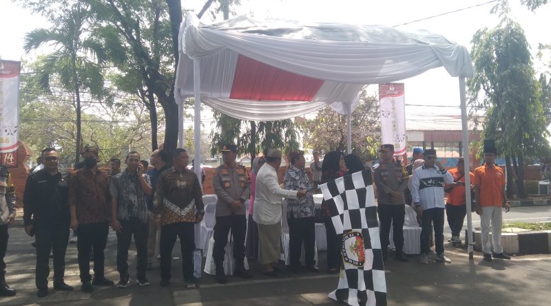 Lewat Kirab Pemilu, Bupati Imron Ajak Masyarakat Salurkan Hak Pilihnya