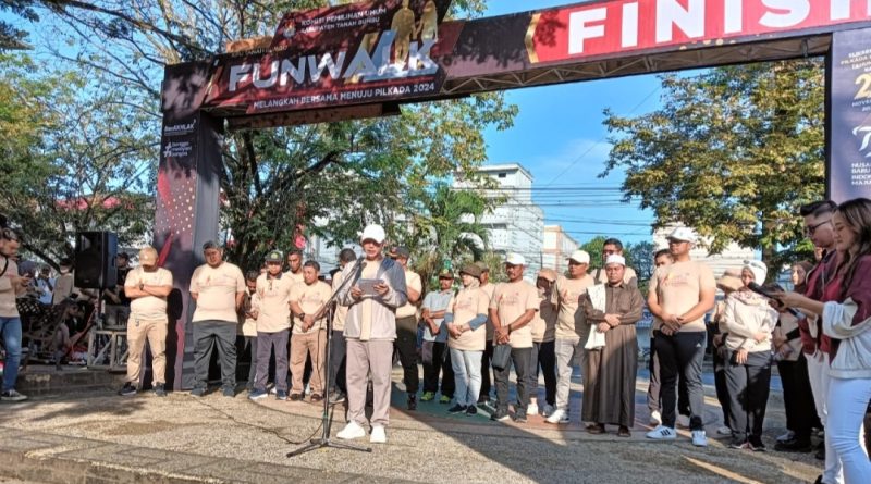 KPU Tanah Bumbu Gelar Jalan Sehat Sosialisasi Pilkada 2024 : Ribuan Warga Antusias Menyambut Demokrasi